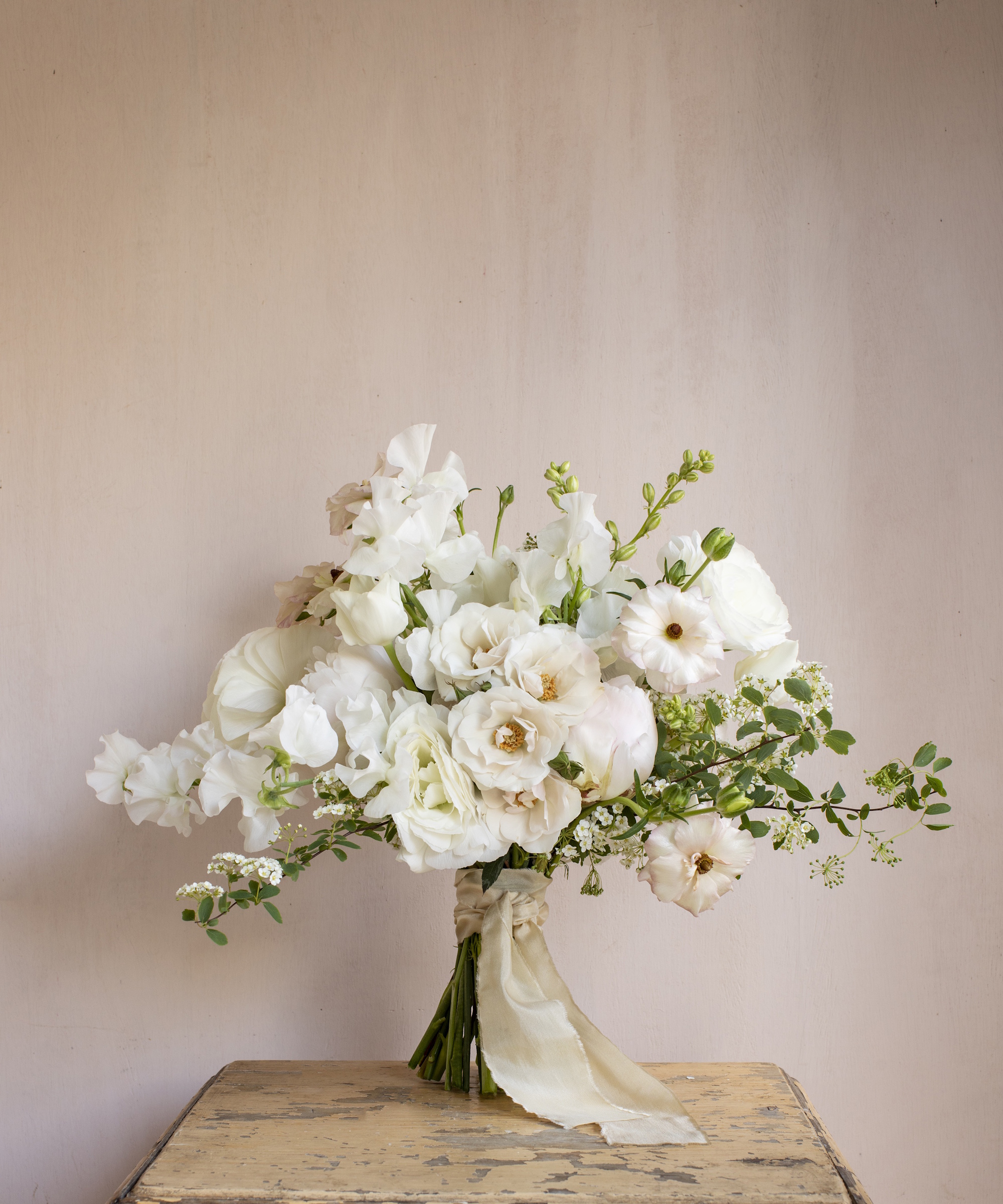 white, cream and green hand-tied bouquet