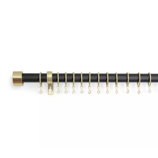 Black extendable curtain pole with gold details