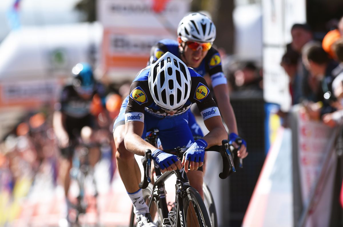 Julian Alaphilippe (Etixx - Quick-Step) hands his head after finishing second