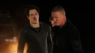 Tom Sandoval and Jason Fox standing outside in the dark in Special Forces: World's Toughest Test season 2