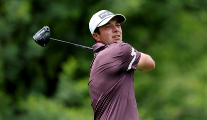Viktor Hovland hits a driver off the tee