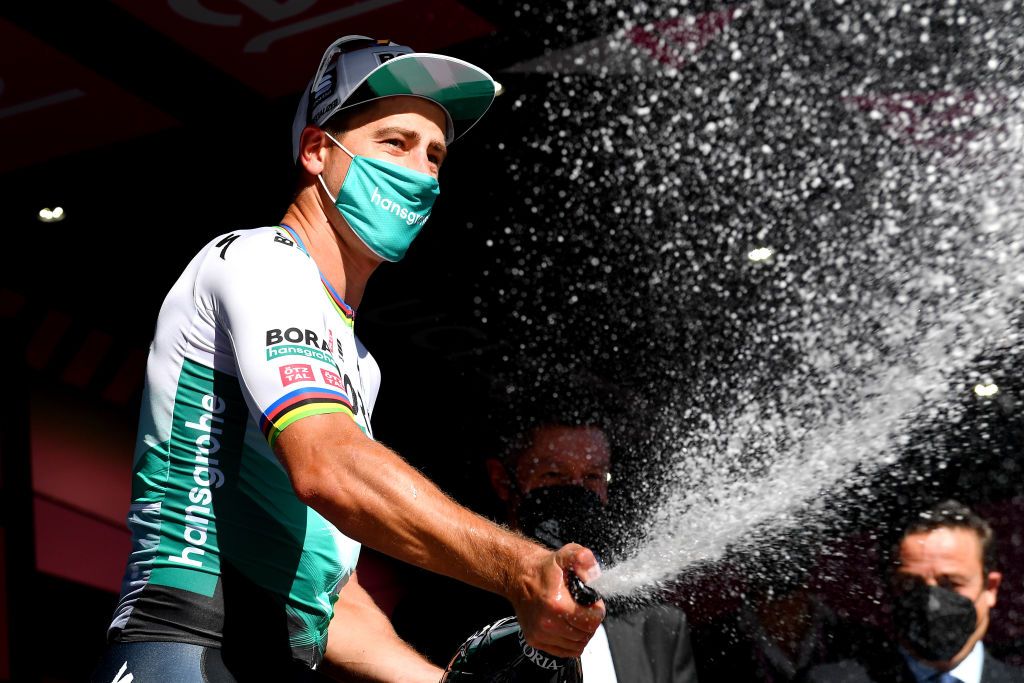 FOLIGNO ITALY MAY 17 Peter Sagan of Slovakia and Team Bora Hansgrohe celebrates at podium during the 104th Giro dItalia 2021 Stage 10 a 139km stage from LAquila to Foligno Mask Covid safety measures Champagne girodiitalia Giro on May 17 2021 in Foligno Italy Photo by Stuart FranklinGetty Images