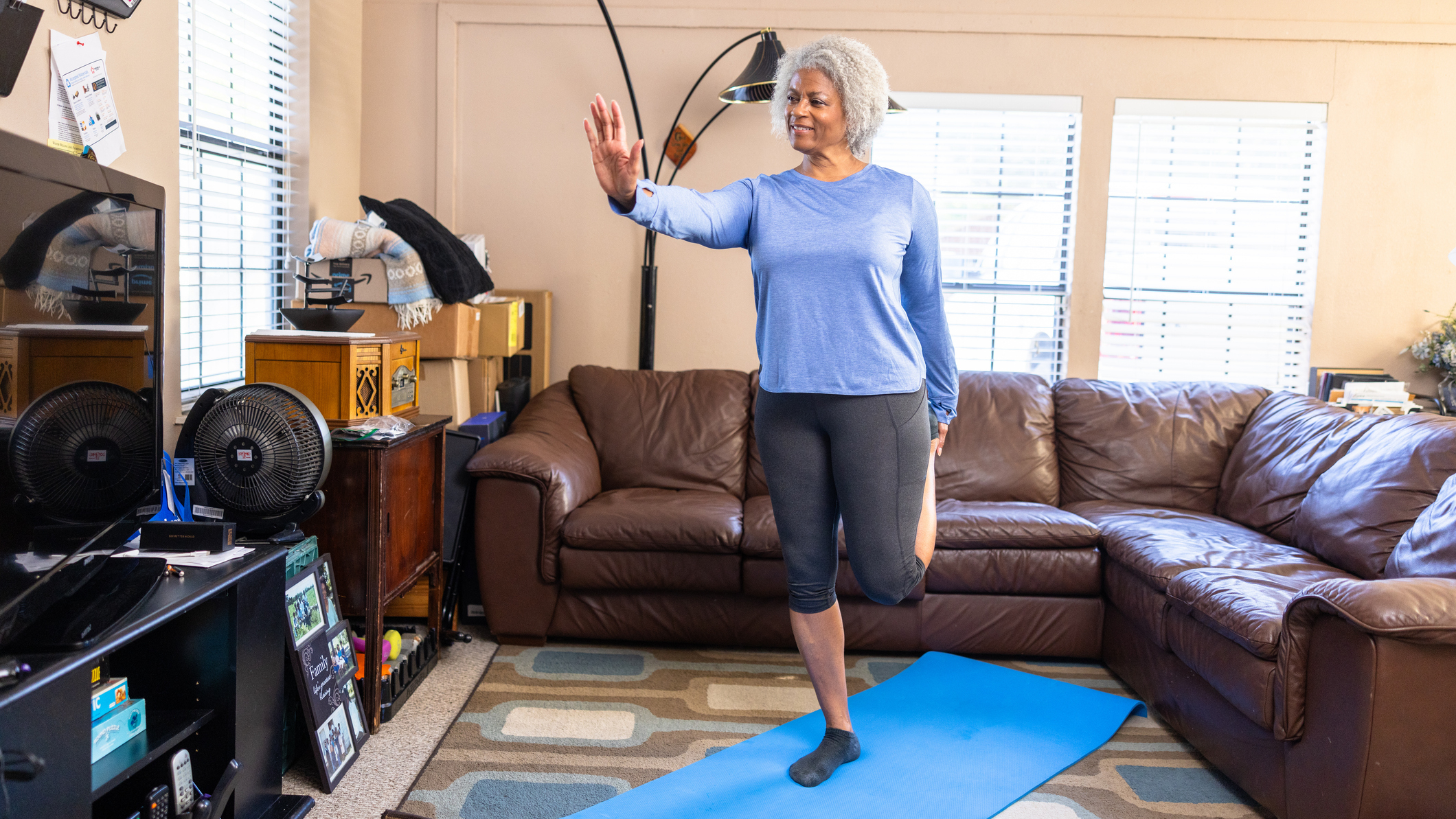 Woman stretching at home