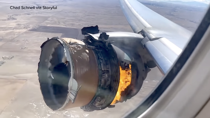 Boeing 777 with engine on fire