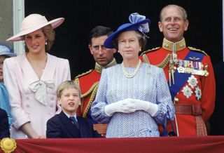 Queen Elizabeth II, Prince Philip, Prince Charles, Diana Princess of Wales and Prince William stand on the balcony of Buckingham Palace for Trooping The Colour. Hat by Philip Somerville.