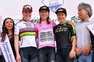 UDINE ITALY JULY 14 Podium Anna Van Der Breggen of The Netherlanda and Boels Dolmans Cycling Team Annemiek Van Vleuten of The Netherlands and Team Mitchelton Scott Pink Leader Jersey Amanda Spratt of Australia and Team Mitchelton Scott Celebration Miss Hostess during the 30th Tour of Italy 2019 Women Stage 10 a 120km stage from San Vito al Tagliamento to Udine 138m Giro Rosa GiroRosa GiroRosaIccrea on July 14 2019 in Udine Italy Photo by Luc ClaessenGetty Images