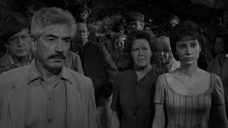 A group of people looking upset in The Twilight Zone episode The Old Man in the Cave