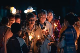 Locals attend a spiritual ritual ceremony in Laos cewe 2022