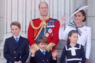 Prince William, Princess Kate, Prince George, Prince Louis, Princess Charlotte waving on the balcony of Buckingham Palace