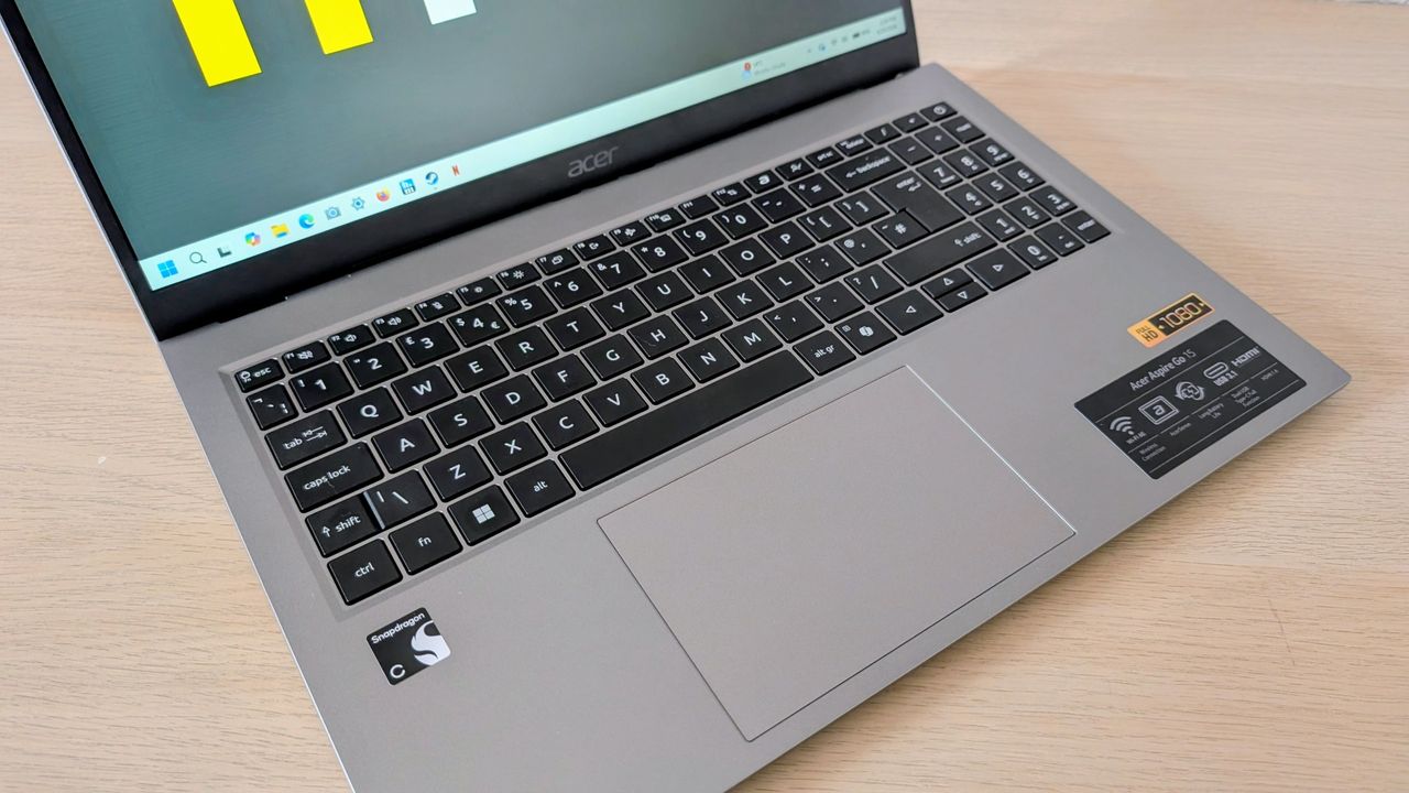 The Acer Aspire Go on the ITPro background