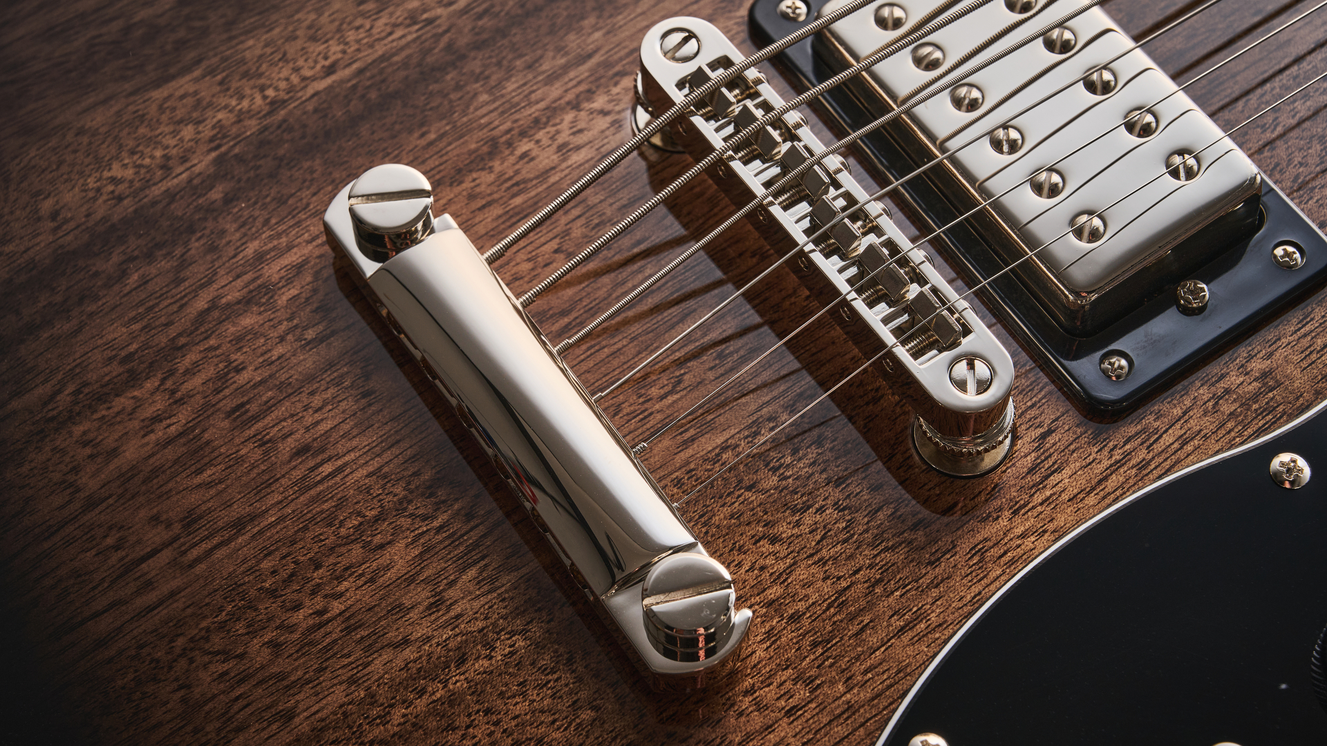 Gretsch Electromatic CVT Baritone in Bristol Fog brown sunburst finish shot on wood.