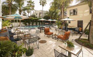Outdoor patio and swimming pool at Generator Miami hotel, Miami, USA