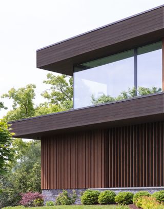 View of corner and terrace at Lake House by Worrell Yeung