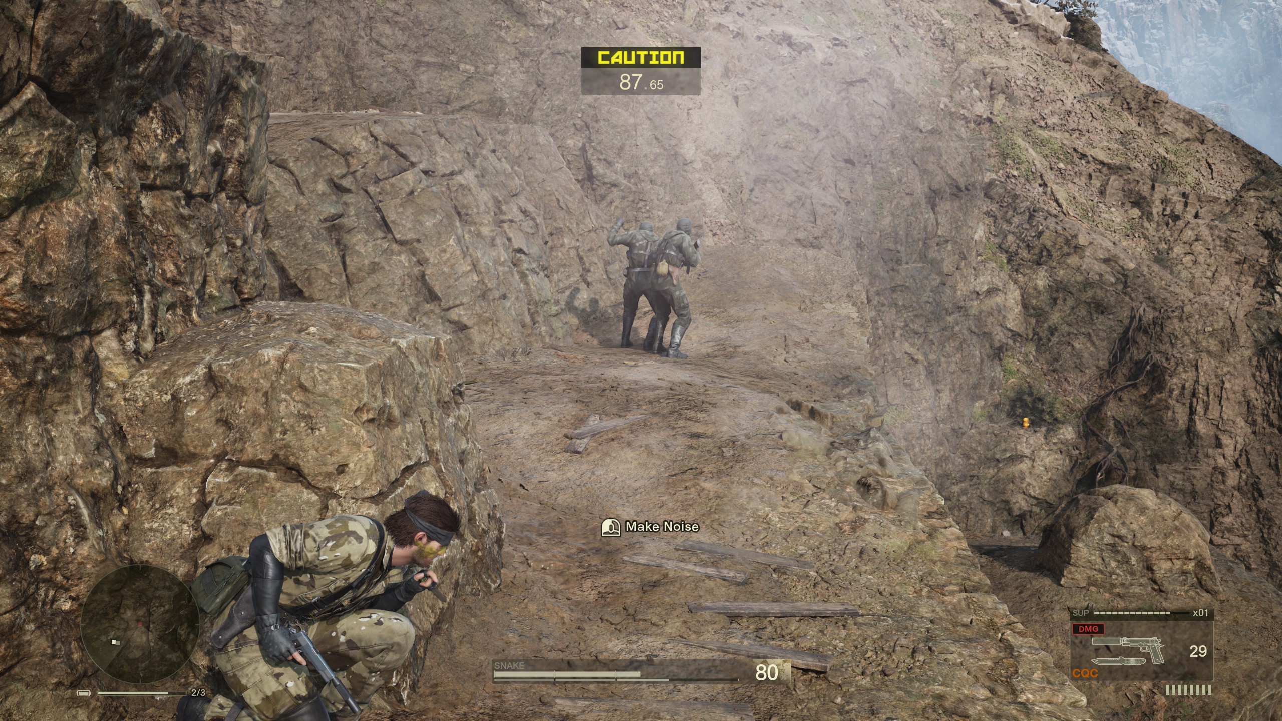Snake hides from guards in Metal Gear Solid Delta: Snake Eater on the Mountainside