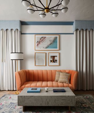 Orange couch in blue suite in the Georgian Hotel