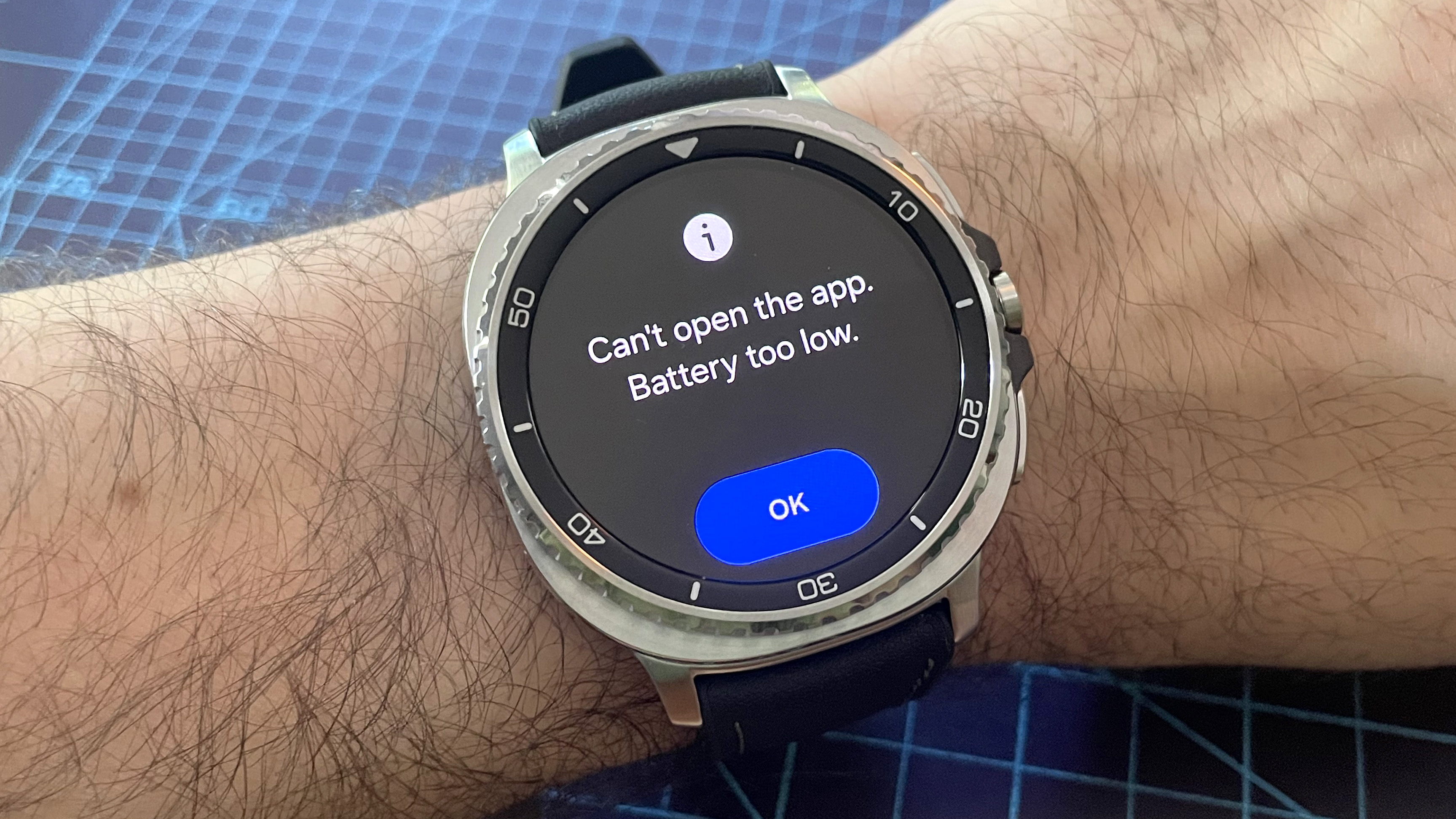Close-up of the Samsung Galaxy Watch 8 Classic in silver on a black strap