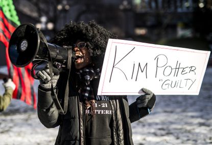 Demonstrator Ashley Dorelus in Minneapolis on Dec. 20, 2021