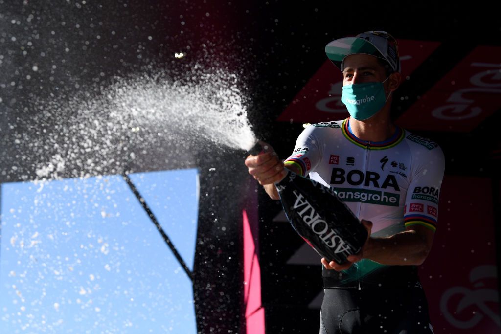 FOLIGNO ITALY MAY 17 Peter Sagan of Slovakia and Team Bora Hansgrohe celebrates at podium during the 104th Giro dItalia 2021 Stage 10 a 139km stage from LAquila to Foligno Mask Covid safety measures Champagne girodiitalia Giro on May 17 2021 in Foligno Italy Photo by Tim de WaeleGetty Images