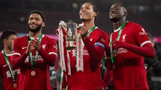 Liverpool&#039;s Joe Gomez, Virgil van Dijk and Ibrahima Konat celebrate their team&#039;s Carabao Cup win in February 2024.