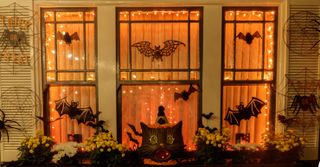 halloween lights in a window