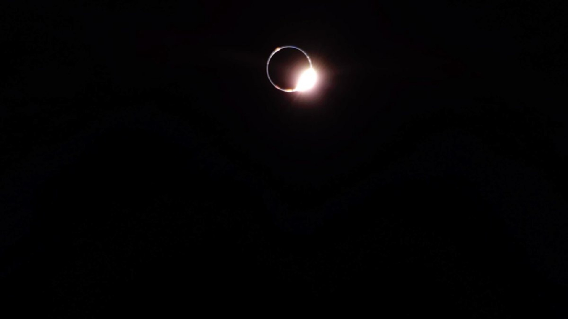 a bright ring of light on a completely black background