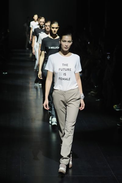Product, Sleeve, Human body, Shoulder, Fashion show, Standing, Joint, Style, Runway, T-shirt,