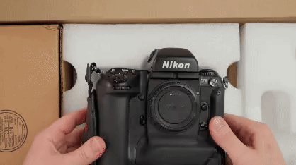 Clip from @kamerastorecom's Reel showing hands picking up and turning around Kodak DCS 760