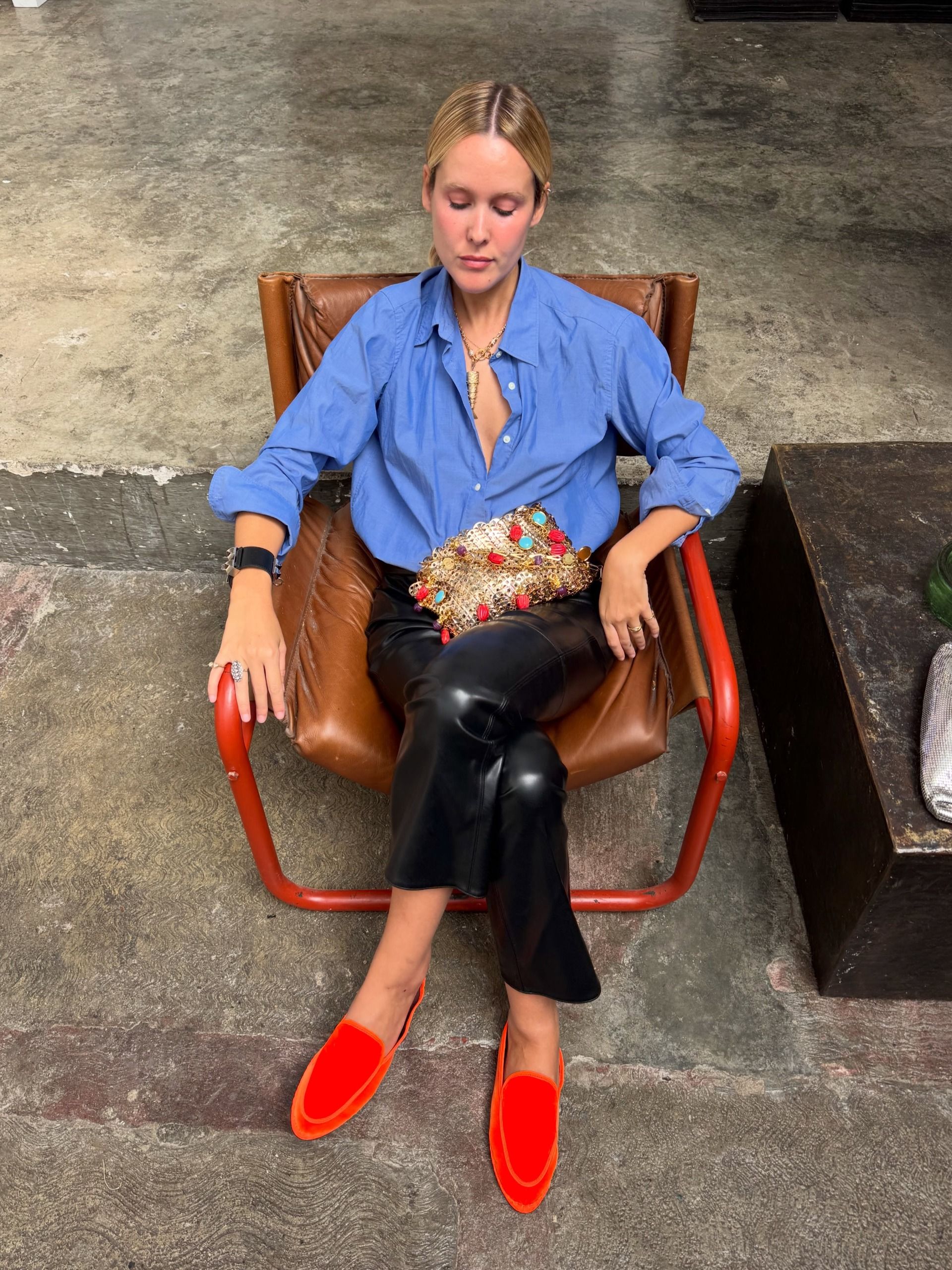Lucia Cuesta wearing a pair of velvet smoking slippers