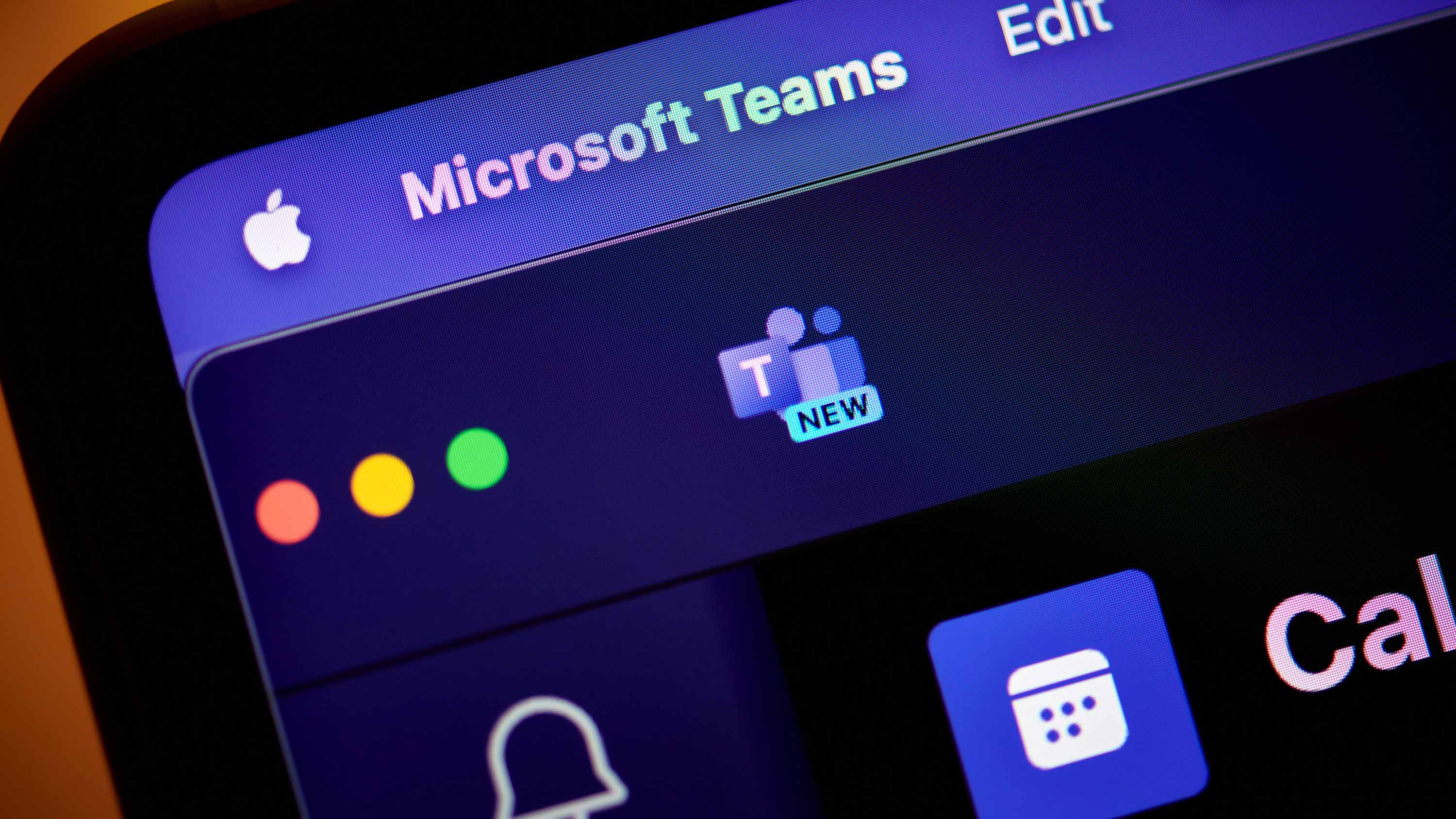 Microsoft Teams app and logo running on a laptop and smartphone.
