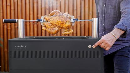 Everdure Fusion cooking a rotisserie chicken