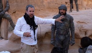 Dune Denis Villeneuve directs on set while Javier Bardem watches