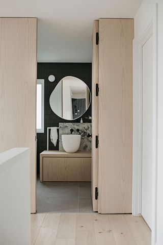 a small bathroom with a large sink on a vanity
