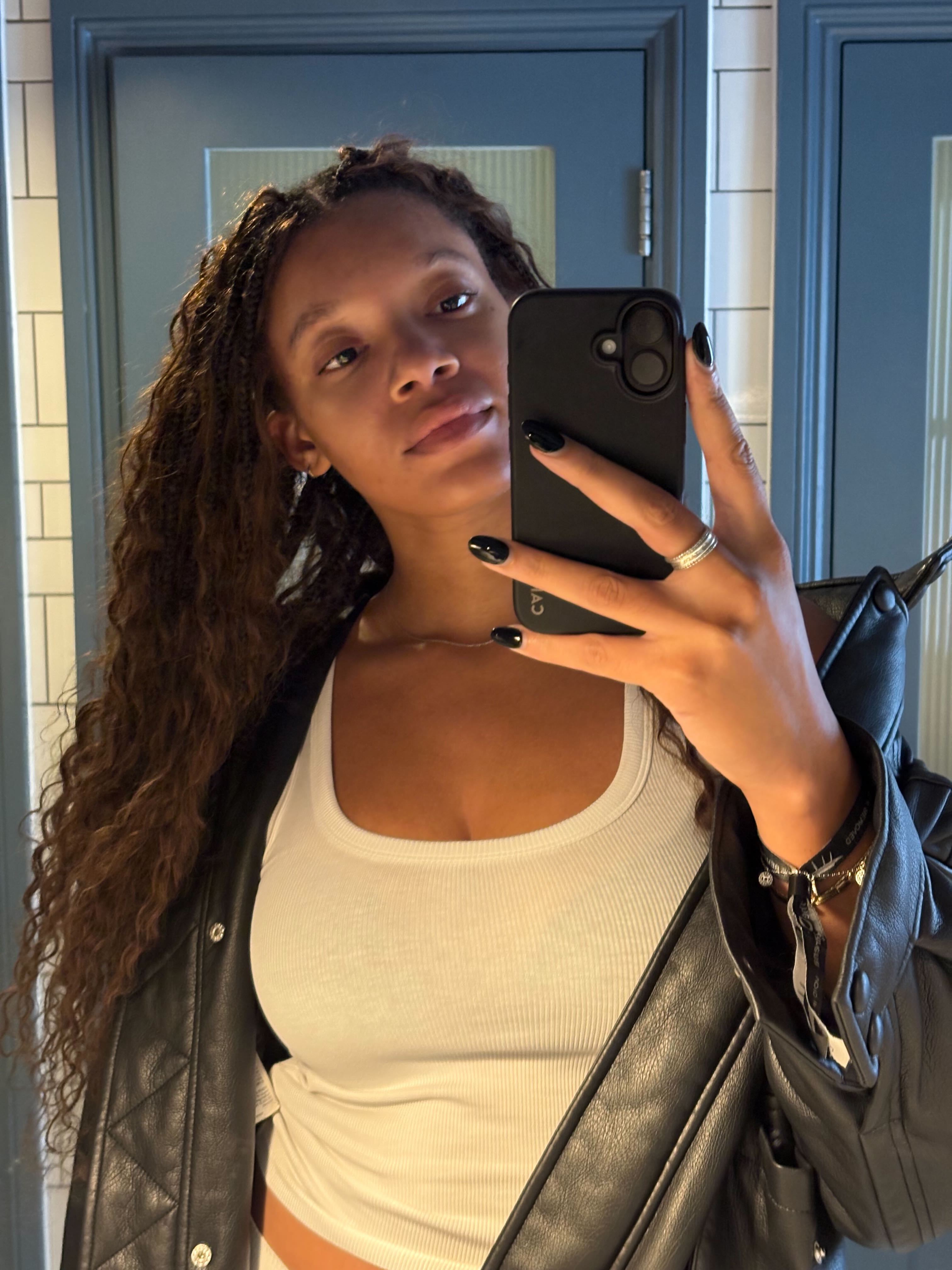 An image of a Skims Tank Top onBest Knockoff Luxury Clothing
's Imani-Nia Francis-Tsolaki.