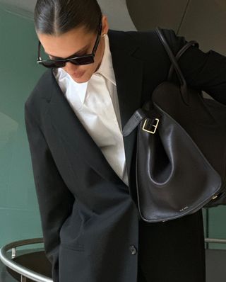 @sobalera wears a Margaux Tote bag