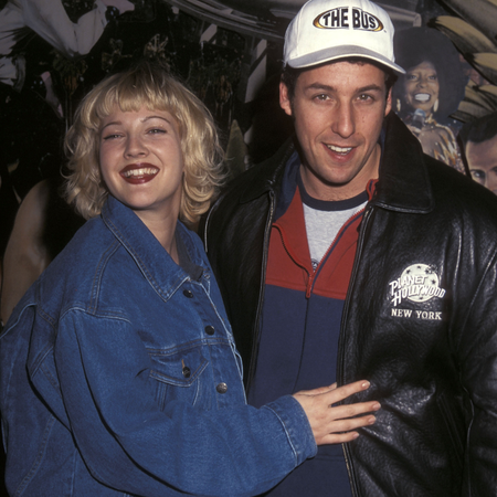 Actress Drew Barrymore and comedian Adam Sandler attend "The Wedding Singer" Memorabilias Donated to Planet Hollywood on February 5, 1998 at Planet Hollywood in New York City