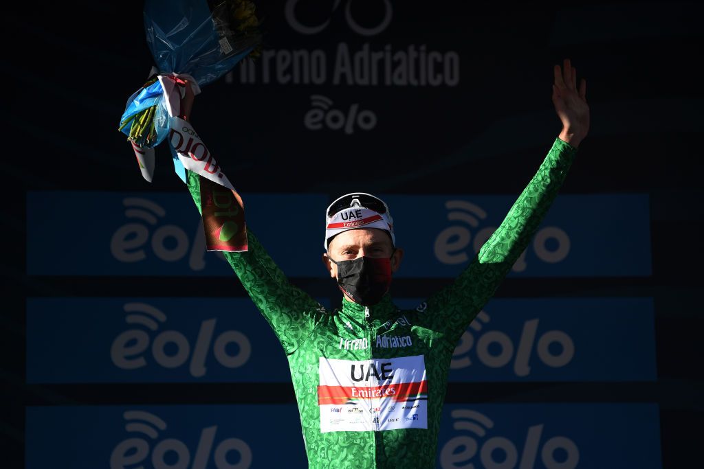 PRATI DI TIVO ITALY MARCH 13 Podium Tadej Pogacar of Slovenia and UAE Team Emirates Green Mountain Jersey Celebration during the 56th TirrenoAdriatico 2021 Stage 4 a 148km stage from Terni to Prati di Tivo 1450m Mask Covid Safety Measures TirrenoAdriatico on March 13 2021 in Prati di Tivo Italy Photo by Tim de WaeleGetty Images