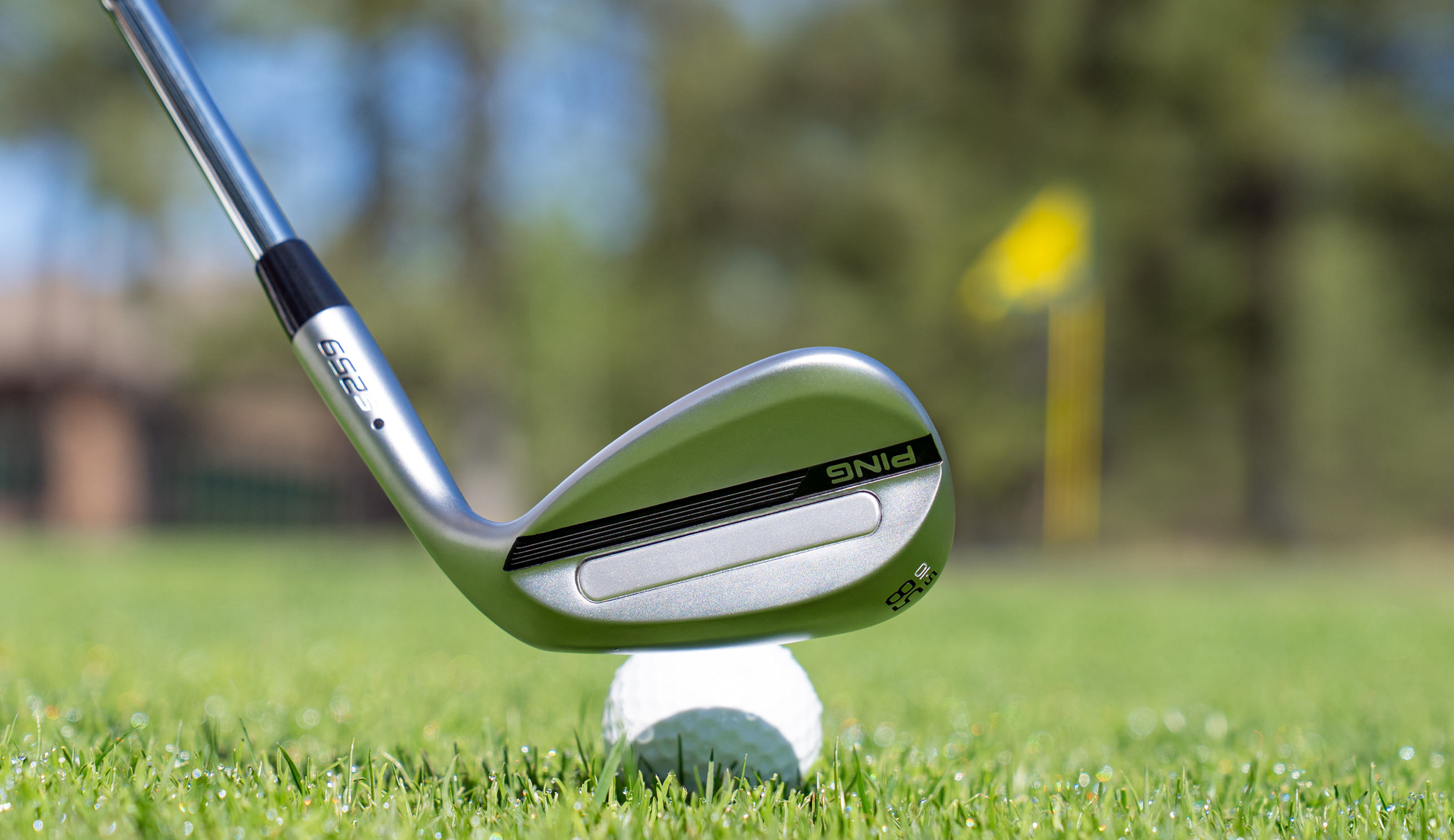 The Ping S259 wedge behind the golf ball