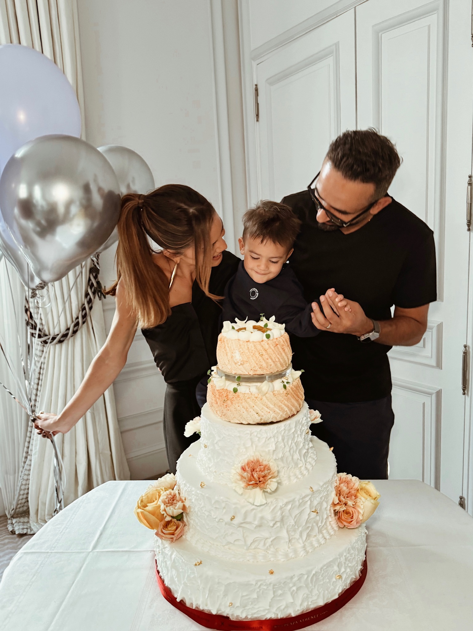 Camila Coelho with her husband and son