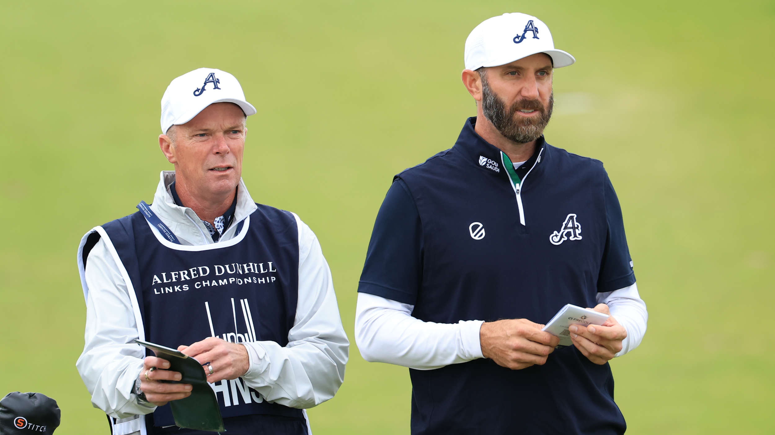 Dustin Johnson and his caddie at the Alfred Dunhill Links Championship