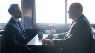 Matt Murdock and Wilson Fisk sitting at a diner booth in Daredevil: Born Again season 1