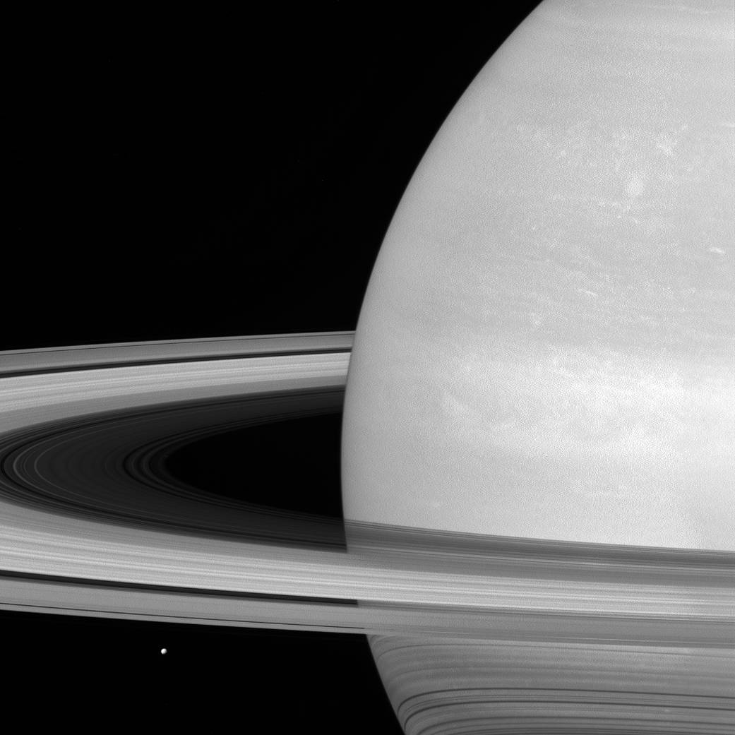 Mimas and Saturn&#039;s Rings