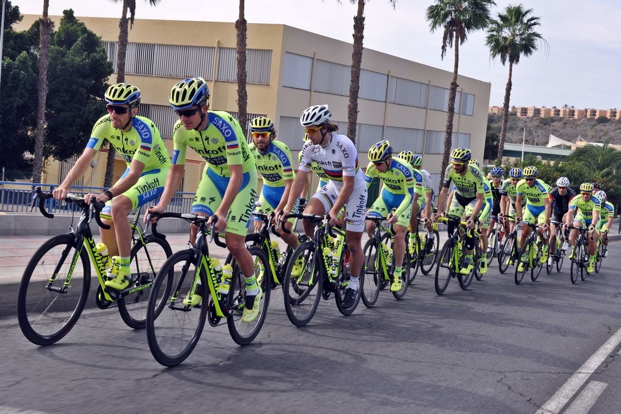 Peter Sagan stretches his legs out while on the ride