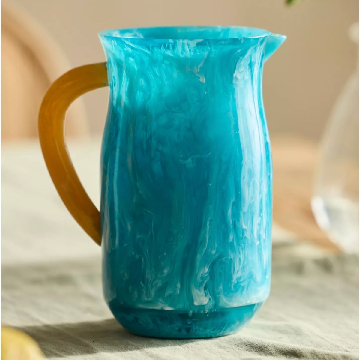 A blue pitcher