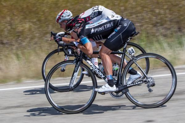 Caleb Fairly (Spidertech) and David Williams (Competitive Cyclist) try to make up time on one of the descents.