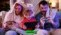 Family of three sitting on the couch using different devices with the green Exetel logo on the bottom