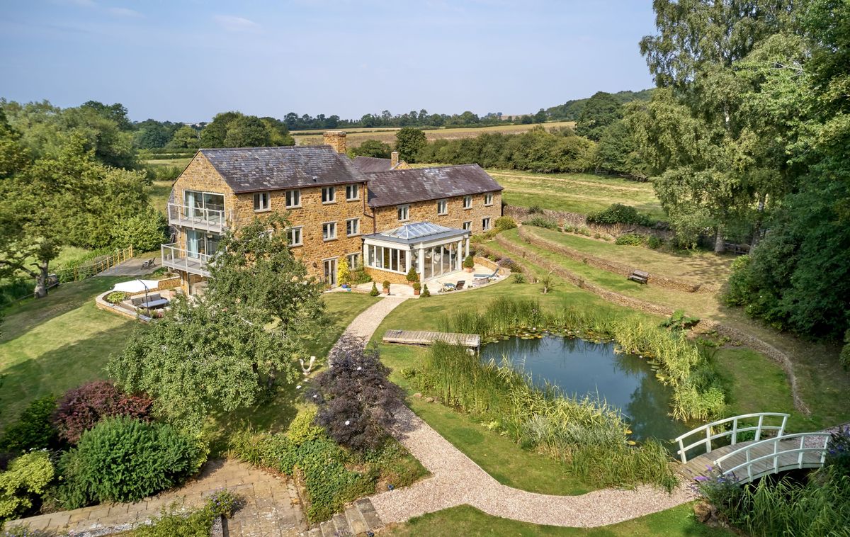 Old water mill converted into a energy efficient modern home heated with an underfloor heat pump