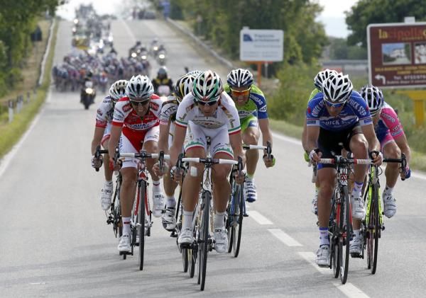 Pozzato takes a turn as the escape tries to stay clear of the peloton