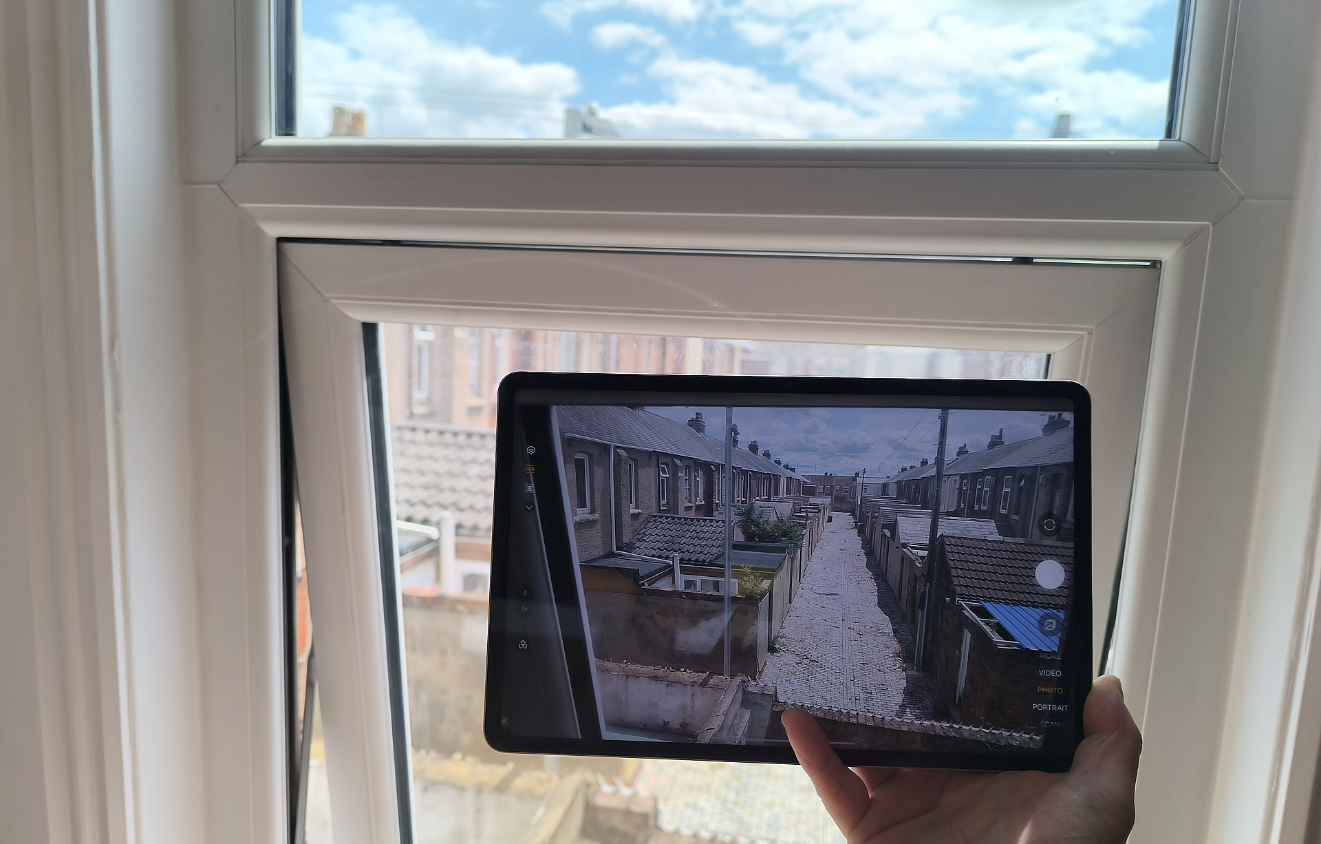 Taking a photo out of the window with an Honor Pad 10 tablet
