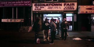 Arcade enthusiasts wait in front of Chinatown Fair in The Lost Arcade