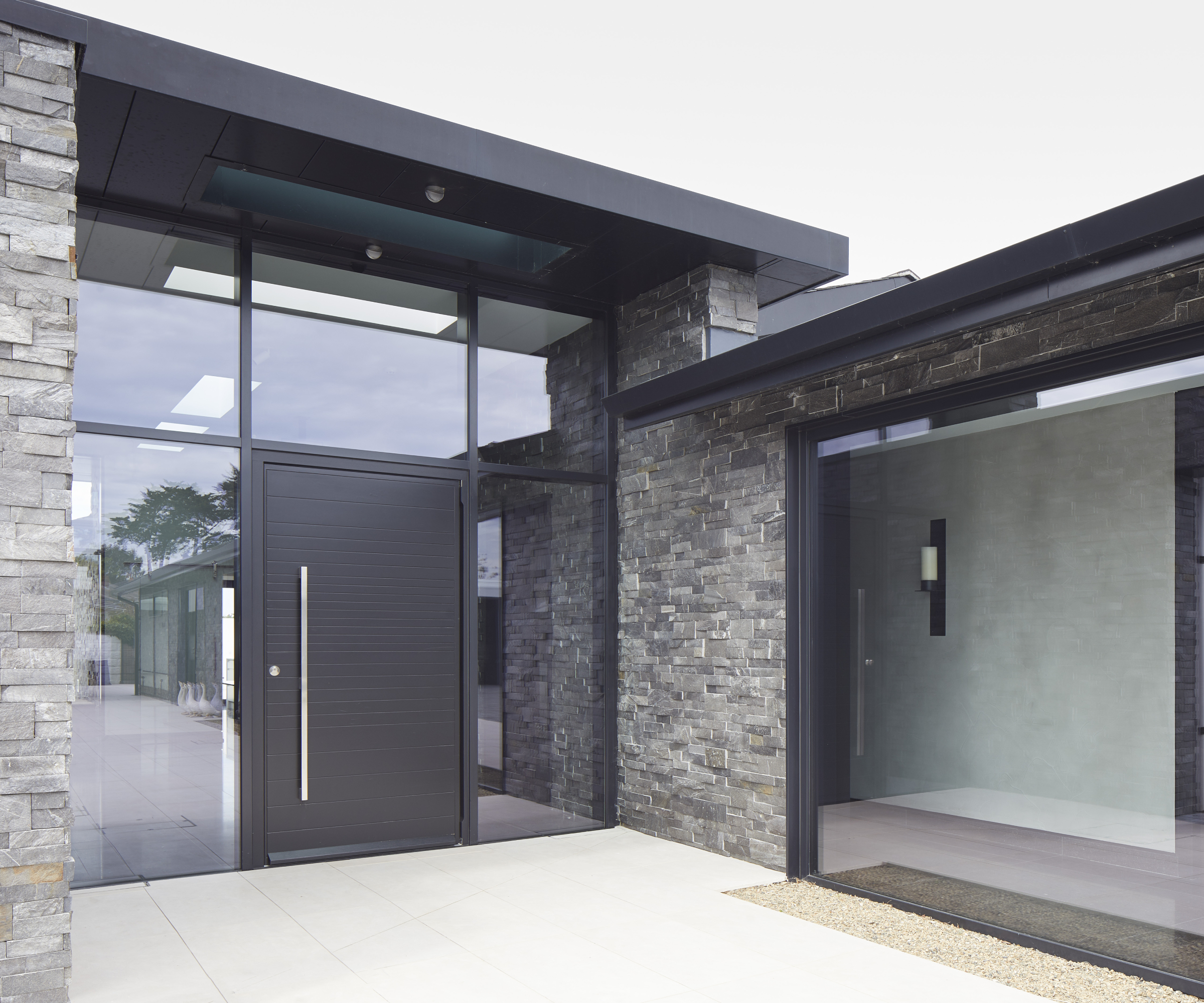 large black front door on contemporary home